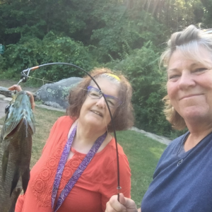 Adult resident and staff fishing
